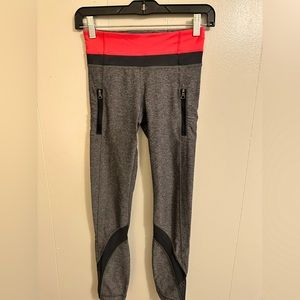 Lululemon full length leggings. Women’s size 2. Dark Heather grey